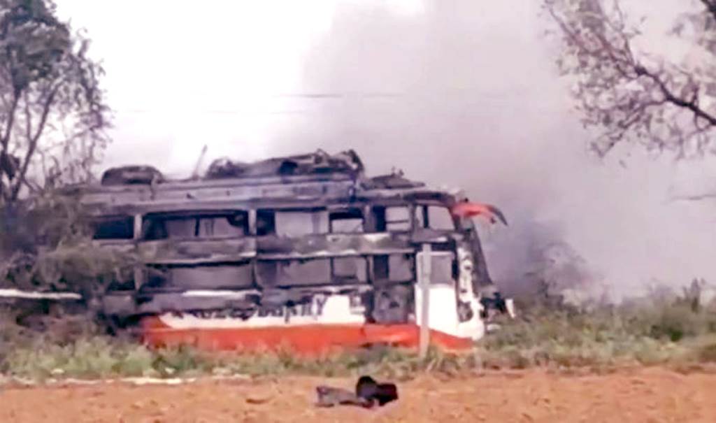 Private bus catches fire after coming into contact with wire 2 dead